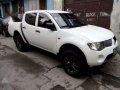 Mitsubishi Strada 2009 Manual White For Sale-0