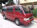 2009 Nissan URVAN ESCAPADE MT Red For Sale-1