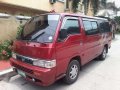 2009 Nissan URVAN ESCAPADE MT Red For Sale-0