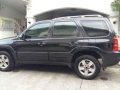 2009 Tribute 4x2 SUV black for sale -0