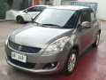 Suzuki Swift 2015 manual trans gray 8k mileage for sale -9