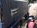 Isuzu elf dropside 10ft well kept for sale -6