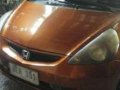 Honda fit 2003 hatchback orange for sale -0