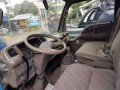 Isuzu 4HF1 elf mini dump NEGOTIABLE upon viewing-1