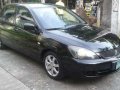 Mitsubishi lancer GLX 2009 manual-0