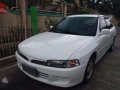 Mitsubishi Lancer Pizza Glxi 1997 AT White -0