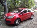 2013 Kia Rio 1.4 EX MT Red Sedan For Sale-1