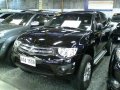 For sale Black Mitsubishi Strada 2014-2