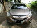 Hyundai Tucson Matic 2011 Brown For Sale -2