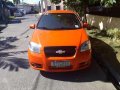 Chevrolet Aveo Sedan 2010 Orange For Sale -3