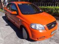 Chevrolet Aveo Sedan 2010 Orange For Sale -5
