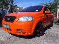 Chevrolet Aveo Sedan 2010 Orange For Sale -7