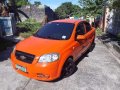 Chevrolet Aveo Sedan 2010 Orange For Sale -6