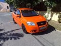 Chevrolet Aveo Sedan 2010 Orange For Sale -2