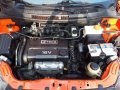 Chevrolet Aveo Sedan 2010 Orange For Sale -9