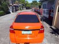 Chevrolet Aveo Sedan 2010 Orange For Sale -4
