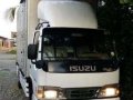 Isuzu Elf Giga NKR 14ft closed van (4HF1) for sale-0