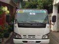 Isuzu Elf Dropside NKR 10ft Japan For Sale -0