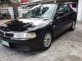 FOR SALE BLACK Mitsubishi Lancer 1999-0