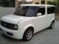 ford fiesta 2011 nissan cube-8