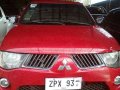 FOR SALE RED Mitsubishi Strada 2008-0