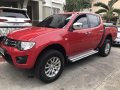 FOR SALE RED Mitsubishi Strada 2014-0