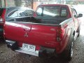 FOR SALE RED Mitsubishi Strada 2008-1