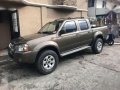 2003 Nissan Frontier 4X4 MT Brown For Sale -0
