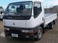 Isuzu Elf Dropside NKR 10ft for sale -0