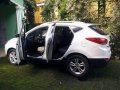 Hyundai Tucson 2010 THETA II A/T-2