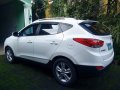 Hyundai Tucson 2010 THETA II A/T-1