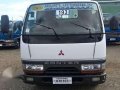 Isuzu Elf Dropside NKR 10ft for sale -1