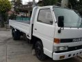 isuzu elf dropside 12ft-1
