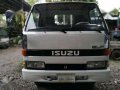 isuzu elf 4WD dropside cargo-0
