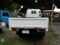 isuzu elf 4WD dropside cargo-1