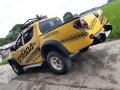 2010 Mitsubishi Strada GLX Manual 4x2 Off Road Look -0