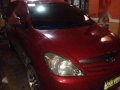 Toyota Innova j 2010 Van red for sale -3