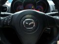 Mazda 3 Black. Low mileage. Very good quality. Automatic-4