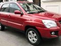 2010 Kia Sportage 4x4 AT Red SUV For Sale -0