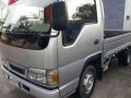 ISUZU ELF dropside-0