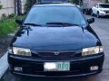 1999 Mazda Familia 323 Gen 2.5 AT Pearl Black-0