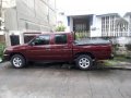 Nissan Frontier Bravado 2013 Red For Sale -0