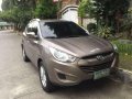Hyundai Tucson 2011 AT Brown For Sale -0