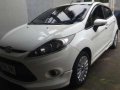 Ford Fiesta 2012 Hatchback MT White For Sale -0