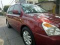 Kia Carnival 2.9 2009 CRDi AT Red For Sale -1