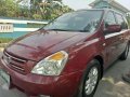 Kia Carnival 2.9 2009 CRDi AT Red For Sale -0