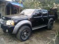 Nissan Frontier 4x4 MT-2006 Black For Sale -0