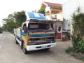 Isuzu Elf 4HF1 2002 MT Truck Yellow For Sale -9