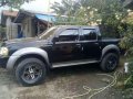 Nissan Frontier 4x4 MT-2006 Black For Sale -1