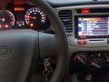 Kia Rio 1.4 AT Sunset Orange 2010 For Sale -1